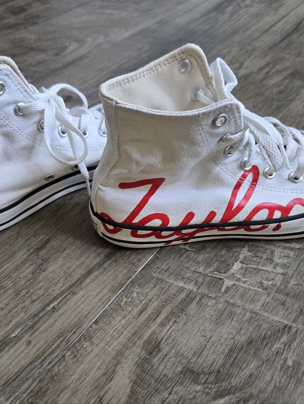 Converse White High-Top Sneakers with Red Script